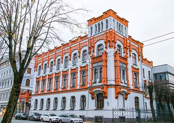 Orange and white building in Latvia 
