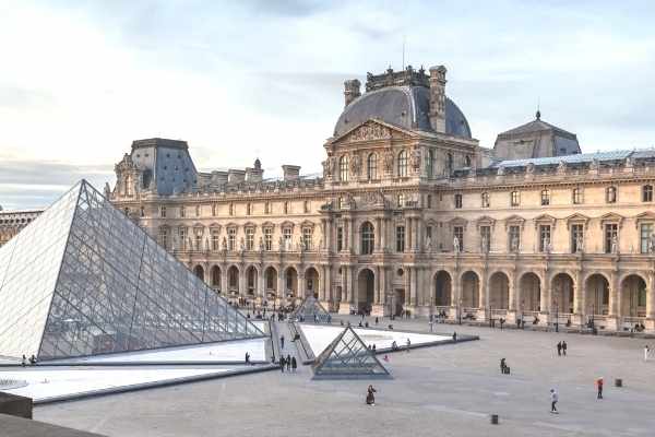 outside view of the Louvre museum with pyramid