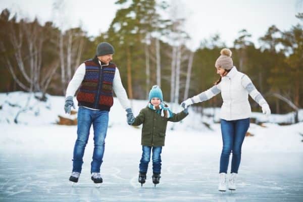Family skating outdoors