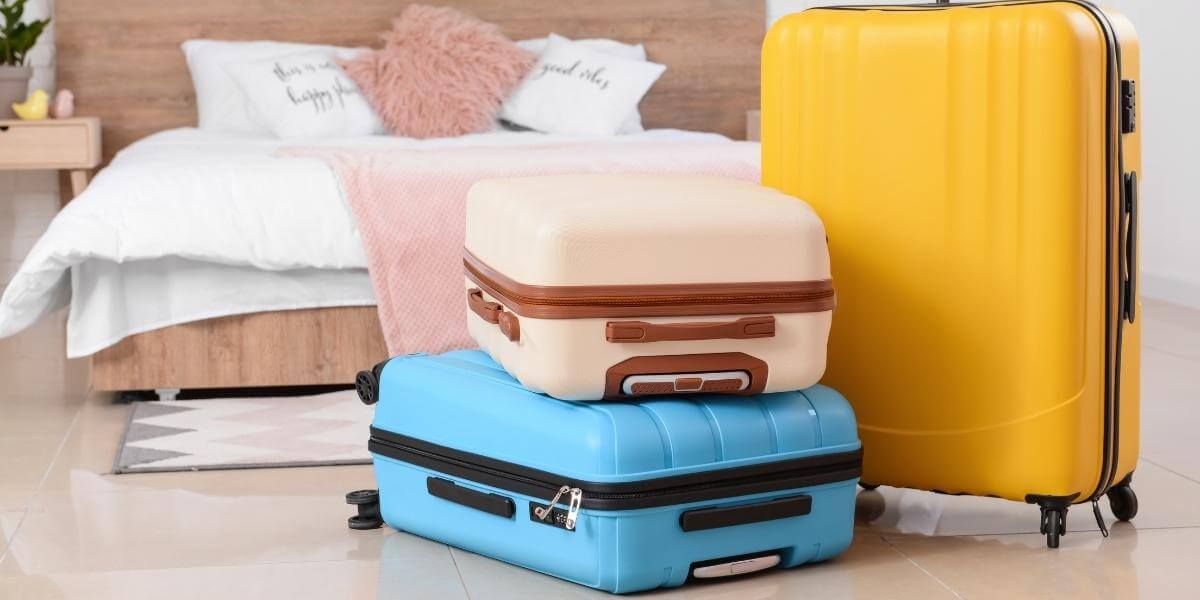 packed suitcases ready for revenge travel